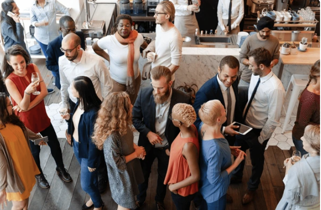 A diverse group exchanging ideas in a collaborative gathering